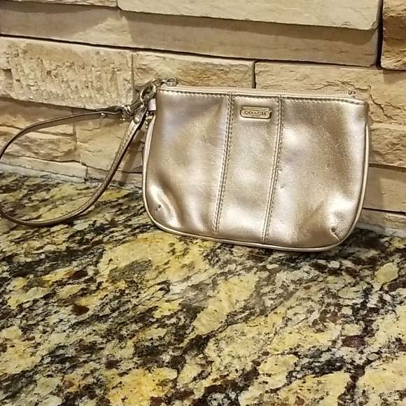 Coach Handbags - ♥️AWESOME♥️ COACH BRONZE LEATHER WRISTLET